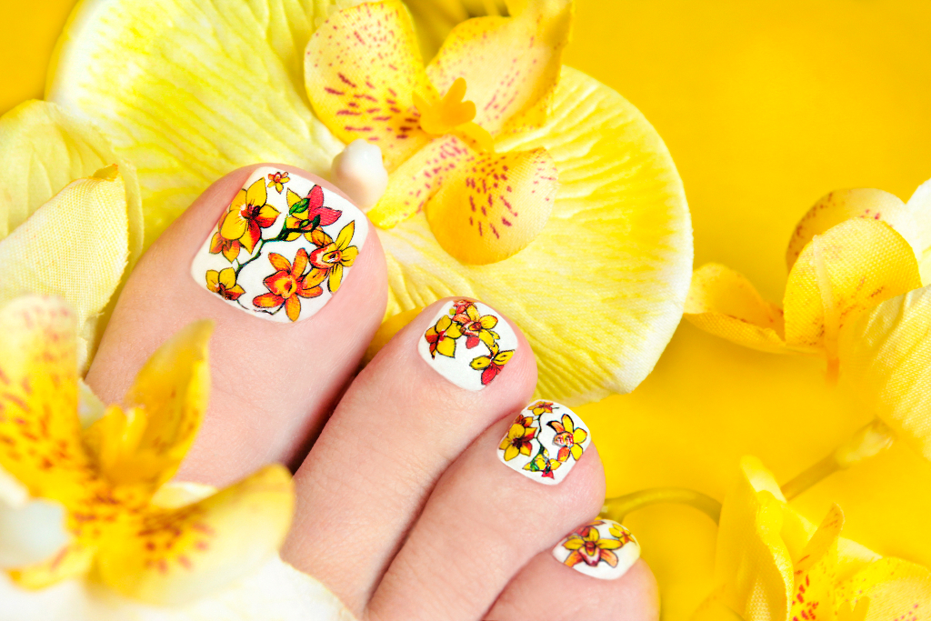 pedicure with yellow orchids